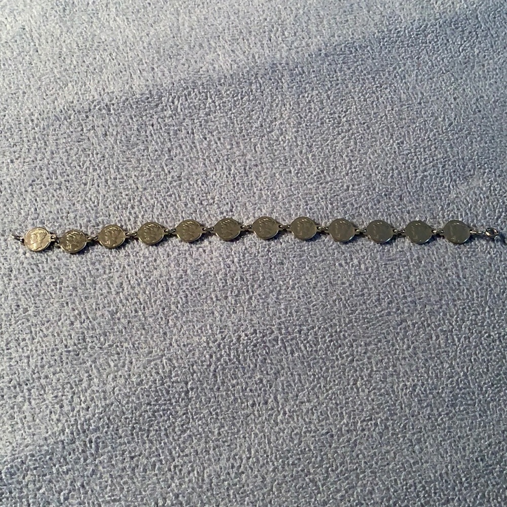 Silver Towne (dime) bracelet.